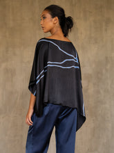Load image into Gallery viewer, woman square top in silk satin black with blue lines wear on a dark blue pant