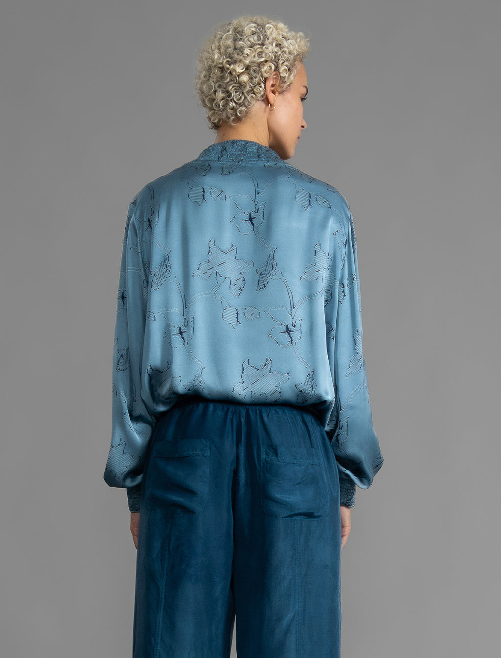 The classic Bomber Jacket reimagined in soft rayon batik. This cool jacket features elasticated cuffs at the wrists and hem for a secure, tailored fit. 