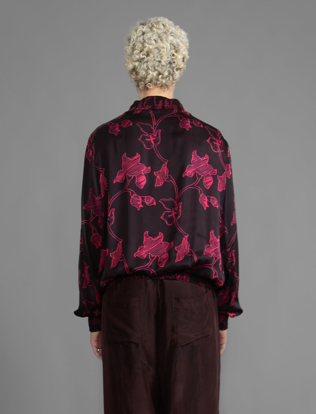 Back: The classic Bomber Jacket reimagined in soft rayon batik. This cool jacket features elasticated cuffs at the wrists and hem for a secure, tailored fit. 