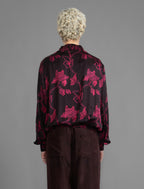 Back: The classic Bomber Jacket reimagined in soft rayon batik. This cool jacket features elasticated cuffs at the wrists and hem for a secure, tailored fit. 