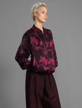 The classic Bomber Jacket reimagined in soft rayon batik. This cool jacket features elasticated cuffs at the wrists and hem for a secure, tailored fit. 