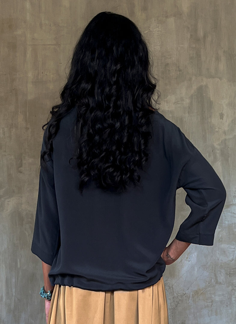 woman silk crepe top long sleeves plain grey dress on a skirt biscotto color