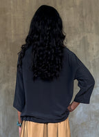 woman silk crepe top long sleeves plain grey dress on a skirt biscotto color