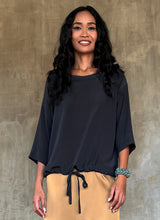 Load image into Gallery viewer, woman silk crepe top long sleeves plain grey dress on a skirt biscotto color
