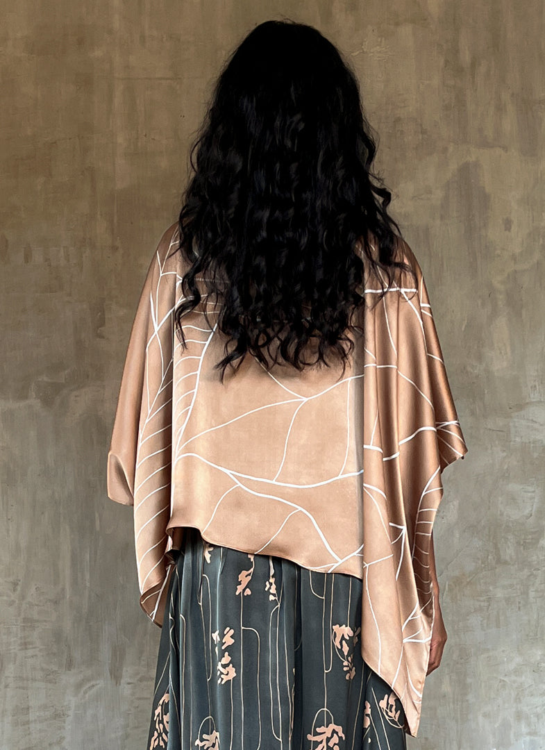 square silk woman top decorated with a floreal pattern batik made in Bali
