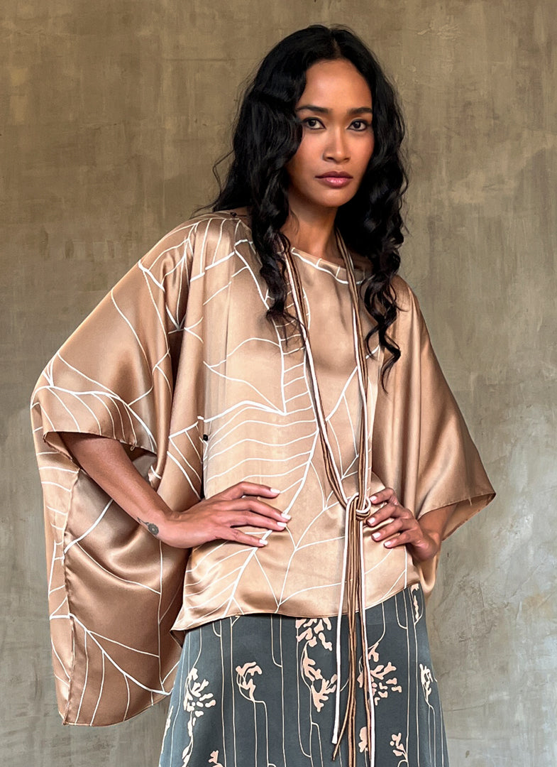 square silk woman top decorated with a floreal pattern batik made in Bali