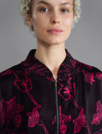 The classic Bomber Jacket reimagined in soft rayon batik. This cool jacket features elasticated cuffs at the wrists and hem for a secure, tailored fit. 