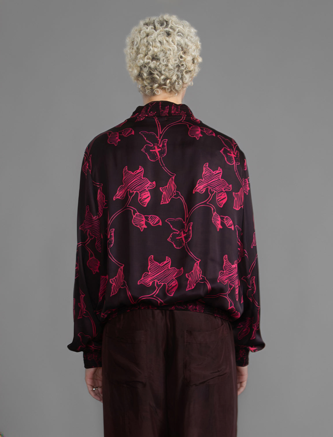 Back: The classic Bomber Jacket reimagined in soft rayon batik. This cool jacket features elasticated cuffs at the wrists and hem for a secure, tailored fi