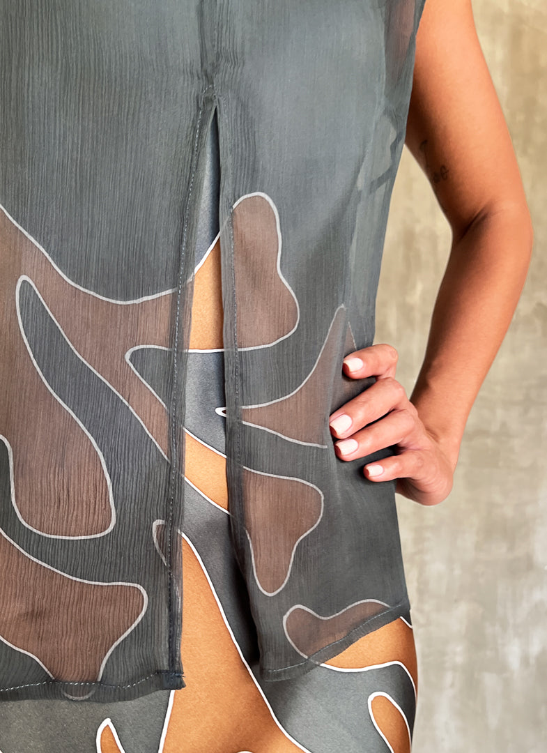 sleeveless silk top grey on a long silk dress with leaf batik decoration