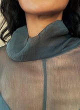 Load image into Gallery viewer, sleeveless silk top grey on a long silk dress with leaf batik decoration
