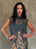 sleeveless silk top grey wear on top of a silk long dress with a leaf batik decoration
