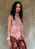 sleeveless silk crepe top pink color on top of a silk satin pant color rusty with batik decoration made in Bali