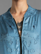 The classic Bomber Jacket reimagined in soft rayon batik. This cool jacket features elasticated cuffs at the wrists and hem for a secure, tailored fit. 