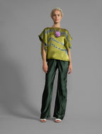 Variation 2. Flowing moss green colour silk top with graphic Macrosnake batik motif in contrasting green tone, featuring fluid draped sleeves, asymmetrical hemline, and versatile contemporary silhouette designed to be worn three ways.