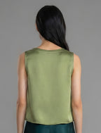Back view. Front view. 100% silk short length stretch singlet in fern green colour with open neckline and wide shoulder straps.
 