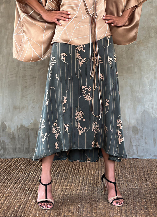 Quarzia Aline Skirt, flowing curved hemline gathered panel across the back -delicate hand painted motif handcrafted from premium silk-Lost Grey-crafted by artisans made in Bali