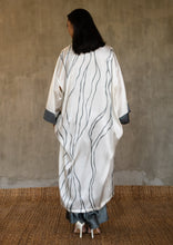 Load image into Gallery viewer, Back detail: Quarzia signature Kimono has wide, flowing sleeves and it&#39;s handcrafted from pure silk satin. As Japanese style&#39; kimono  it is open under the arms, and there&#39;s a bold border on the cuffs and on the front. A beautiful silk belt frame this elegant piece, ultimate in relaxed style, elegance and comfort. The batik pattern is inspired by Kintsugi Japanese technique to fix the broken ceramics.
