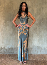 Load image into Gallery viewer, Silk satin handcrafted bias long spaghetti dress in steel grey with maxi foliage pattern front and back. Bias cut dress with low V-neckline.
