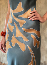 Load image into Gallery viewer, Detail: pattern Maxifolia in grey steel and cashewnut colo. Silk satin bias spaghetti dress.
