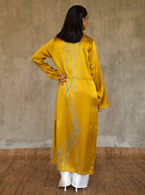 Load image into Gallery viewer, Back detail: Hand-crafted in glossy pure silk, this jacket&#39; neck-line dress it has elegant, structured trumpet cuffs,   discreet pockets and waist drawstring add to the sophistication and comfort. The stunning gold colour is set-off by the contemporary hand-painted Kintsugi design, inspired by the Japanese technique for broken ceramics.
