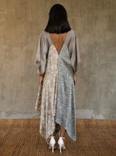Load image into Gallery viewer, Back detail: the  silk satin grey Ally dress is a celebration of modern batik patterns. Multiple designs, inspired by nature, are hand-crafted on silk in various hues of grey. The generous silhouette will suite all sizes.
