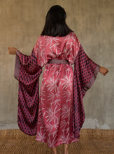 Load image into Gallery viewer, Back detail: Quarzia&#39;s closest take on japanese Kimono&#39; style, glossy batik patterned silk satin with &quot;Furisode&quot; long-hanging sleeves. Formal robe in graphic floral patterns, in pink/white/black colors. Cuffs, front border and belt all in contrast pattern define this timeless piece. 
