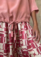round neck pink top in silk crepe on top of knees long pant batik decorated by Bali artisan