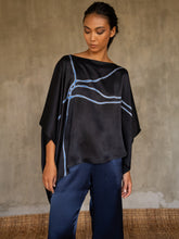 Load image into Gallery viewer, woman square top in silk satin black with blue lines wear on a blue bright pant
