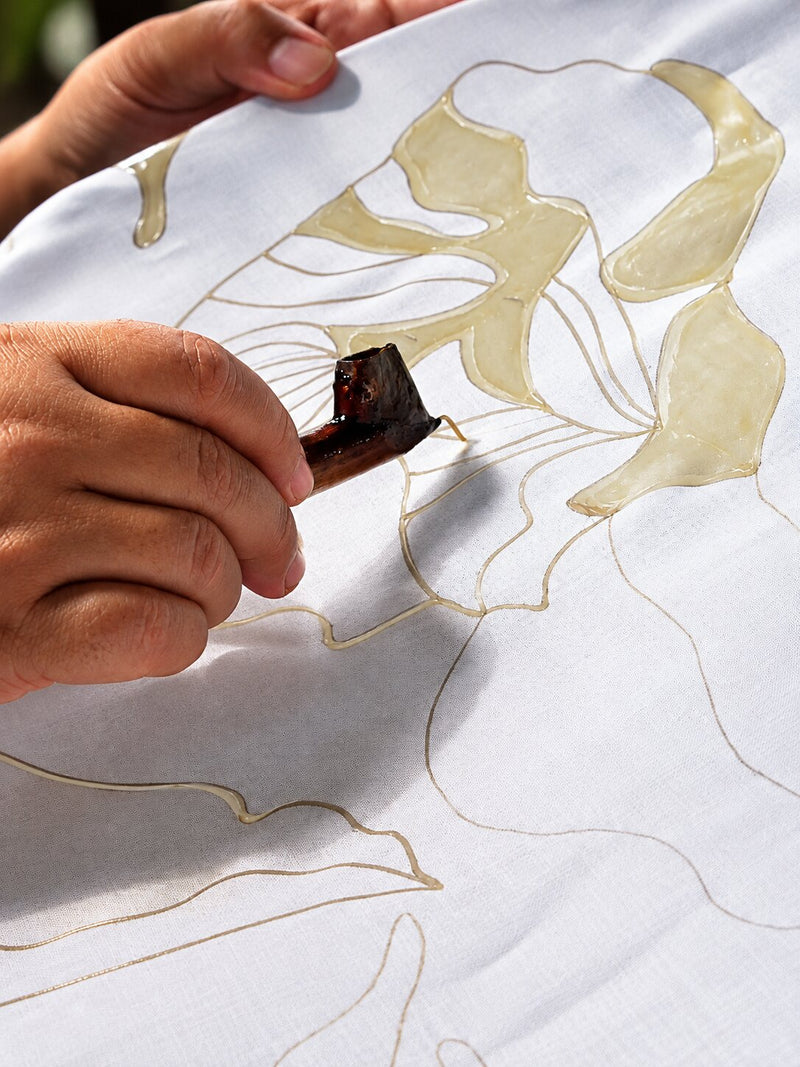 Brush laying deep colour inside the pencil lines