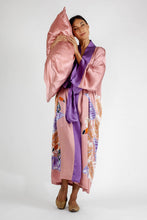Load image into Gallery viewer, Quarzia signature Kimono has wide, flowing sleeves and it&#39;s handcrafted from pure silk satin. As Japanese style&#39; kimono  it is open under the arms. A bold contrast color border on the cuffs and on the front, together with the same color silk belt, frame this elegant piece, ultimate in relaxed style, elegance and comfort. The batik pattern is inspired by the incredible balinese leafy jungle and colorful tucans 
