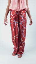 Load and play video in Gallery viewer, KNOT SILK PANT abstract molten-lava
